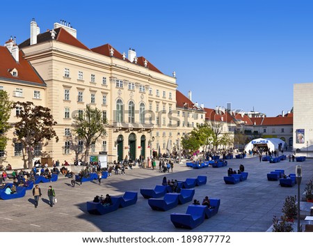 VIENNA, AUSTRIA - APRIL 17: Many people enjoy a sunny afternoon at the Museumsquartier on April 17, 2014 in Vienna, Austria. It is the eighth largest cultural area in the world.