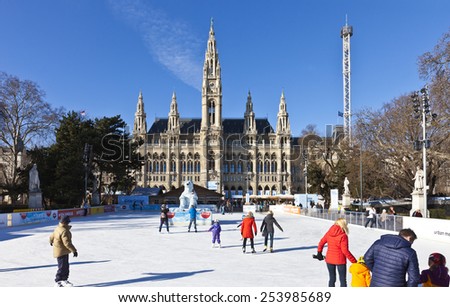 VIENNA, AUSTRIA - JANUARY 31, 2015: Ice skating people at the Wiener Eistraum (ice rink). The town government establishes every winter an ice rink in front of the Viennese city hall.