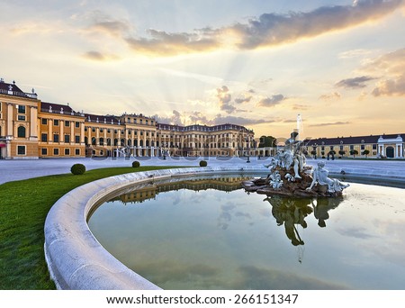Front of the Schoenbrunn Palace in Vienna at sunset - Austria.\
It is a former imperial summer residence and one of the most important cultural monuments and major tourist attractions in the country.