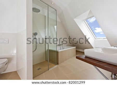 sunlit bathroom with roof top window