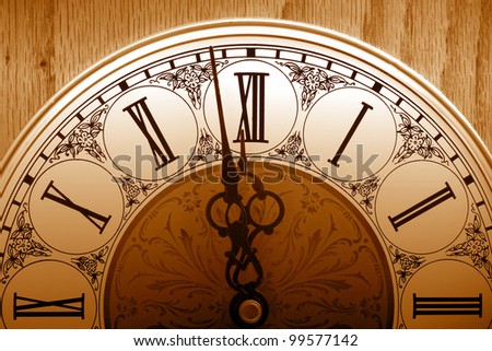 old fashioned clock about to hit 12 midnight