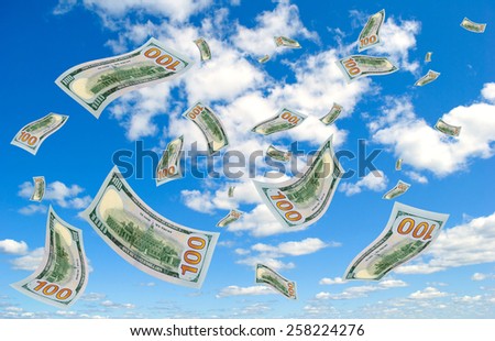 Hundred-dollar bills falling from the sky.