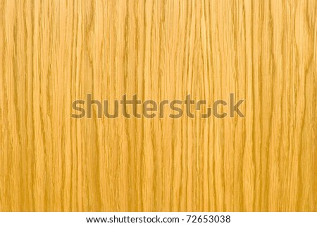 The Wood structure, light oak, as background, filament vertically in frame.