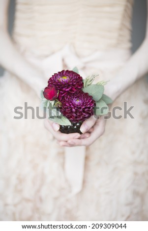 Bridal bouquet with red and burgundy colors
