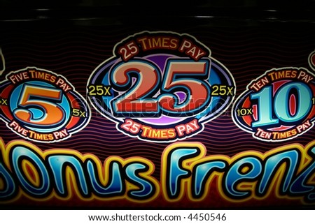 bright colored signs and symbols on a slot machine