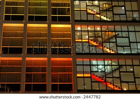 Exterior of an office building in orange lighting
