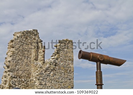 Rustic telescope on ancient ruins