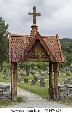 The entrance to the cemetery in Heddal was built in the  stave church style