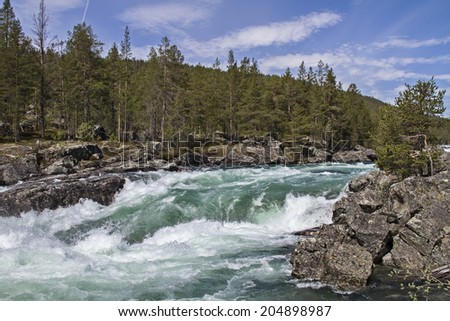 In its course through the Ottadalen the river Otta forms countless massive waterfalls