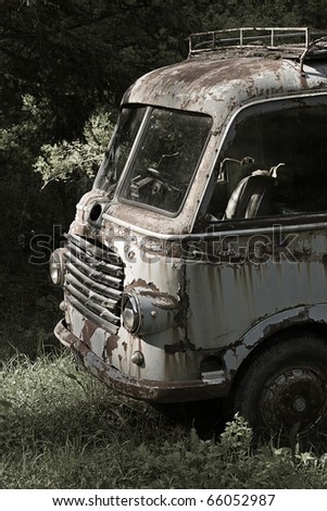 Old van parked in the woods