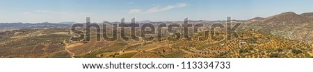 Beautiful panoramic photo overviewing the landscape of Sierra de Grazalema Natural Park. Blue cloudy sky. Andalusia. Spain.