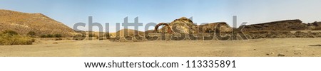 Panoramic photo of western landscape with stone arch. Fort Bravo. Texas Hollywood. Desierto de Tabernas, AlmeriÃ?Â­a. Andalusia. Spain.