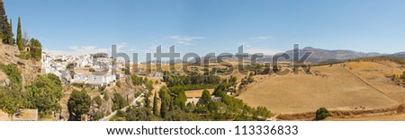 Panoramic photo of the beautiful rural landscape of Ronda. Blue sky. Malaga. Andalusia. Spain.