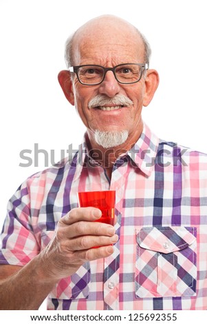 Well dressed senior man holding glass of water. Isolated.