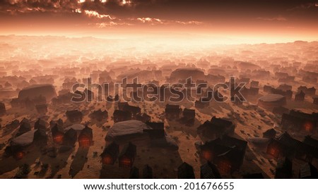 Aerial of remote desert city at sunset in the mist. Lights in houses.