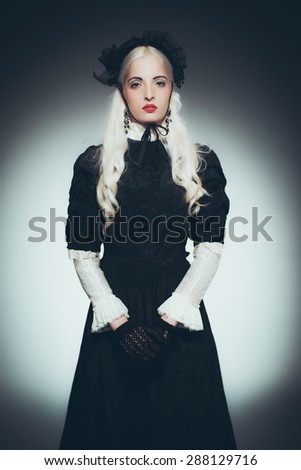 Dramatic Portrait of Woman with White Hair Dressed in Black - Woman Wearing Victorian Style Gown, Gloves and Hat