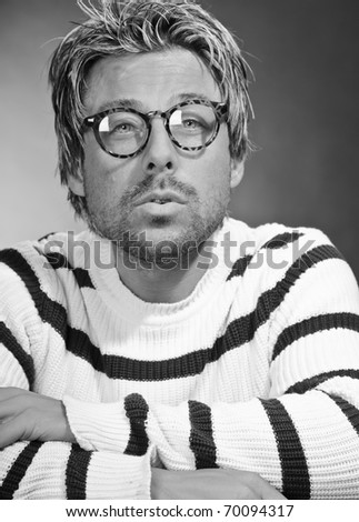Man With Black Hair And Glasses. Short blond hair.