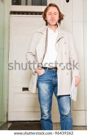 Business man long hair entering office