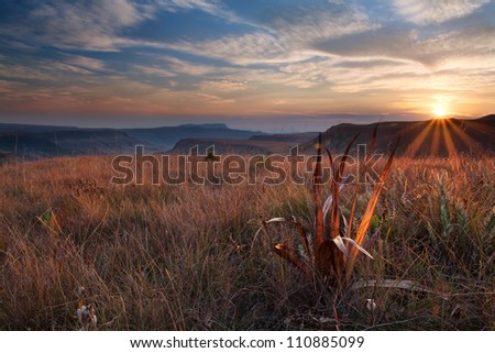 Sunrise over mountain with misty look