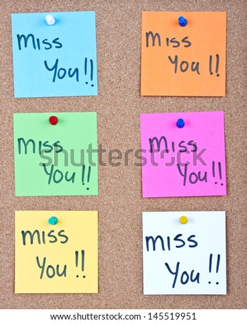 note collage with miss you messages on cork