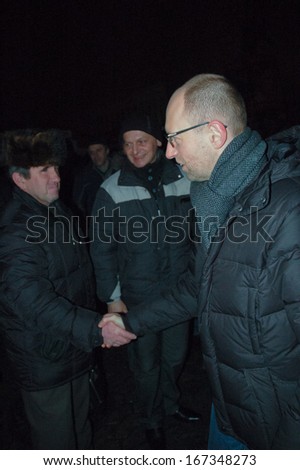 KIEV, UKRAINE - 13 DECEMBER 2013: The leader of Ukrainian opposition Arseniy Yatsenyuk meets with people  on the Maidan Nezalezhnosti  in Ukraine on December 13, 2013 in Kiev, Ukraine.