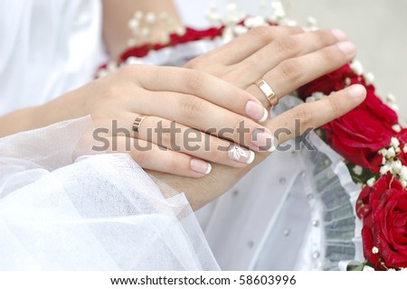hands bride wedding ring bouquet groom ceremony flowers
