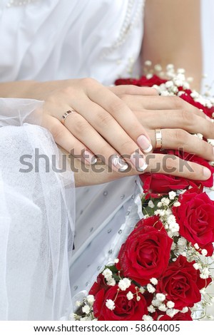 stock photo hands bride wedding ring bouquet groom ceremony flowers