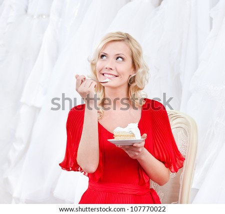 Future bride has the wedding cake, on white background