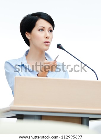 Female presenter at the podium Business conference Female presenter at the podium Business conference