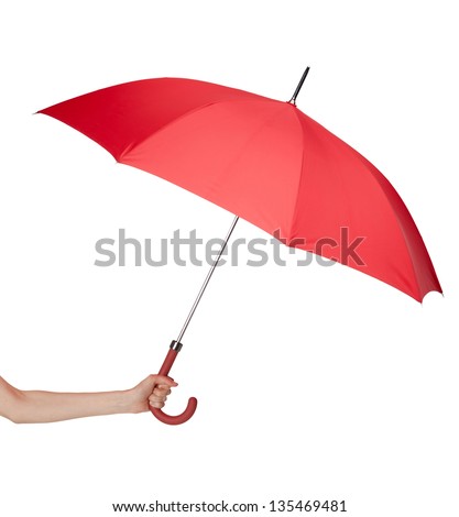Close up of opened red umbrella in hand, isolated on white