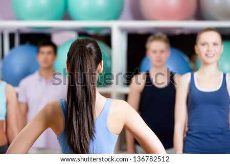Group of people at the gym in a fitness class