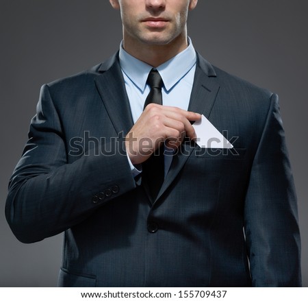 Part Of Body Of Man Who Takes Out White Card From The Pocket Of Business Suit, Copyspace