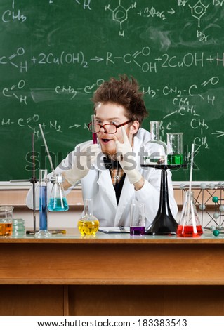 Mad professor does the experiment in his laboratory