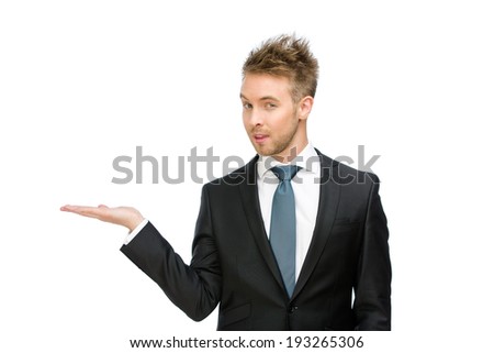 Half-length portrait of executive with palm up, isolated on white. Concept of leadership and success