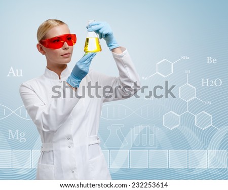 Young woman doctor hands Erlenmeyer flask with yellow water, chemical elements background