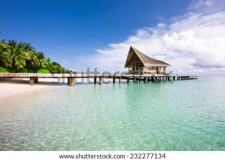 Nice scenery over beach with the water villas, Maldives