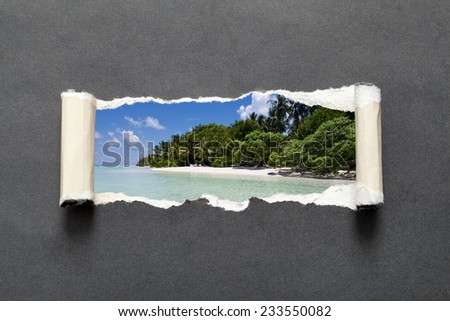 Torn black paper edge with untouched tropical beach in the Indian ocean