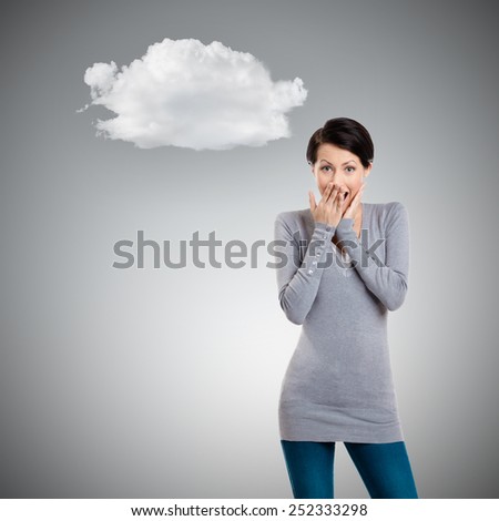 Woman covers her mouth with hand, grey background with cloud
