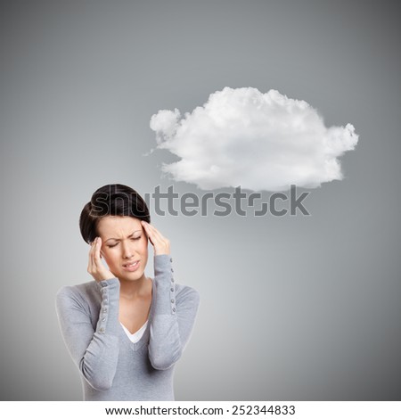 Girl has a headache, grey background with cloud
