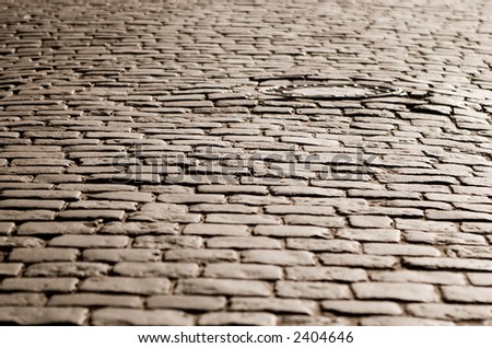 Old cobblestone road in the evening light