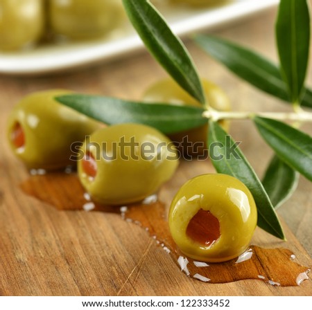 Stuffed Green Olives On A Cutting Board
