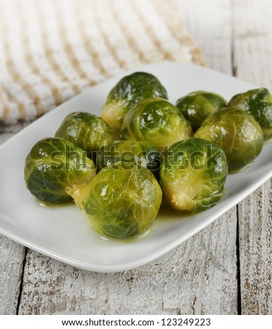 Roasted Brussels Sprouts  In A White Dish