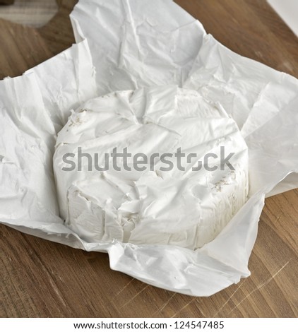 Brie Cheese On A Paper Packaging