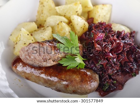Roasted  Bratwurst with Sweet and Sour Red Cabbage and Potatoes