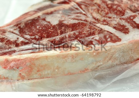 frozen meat wrapped in plastic
