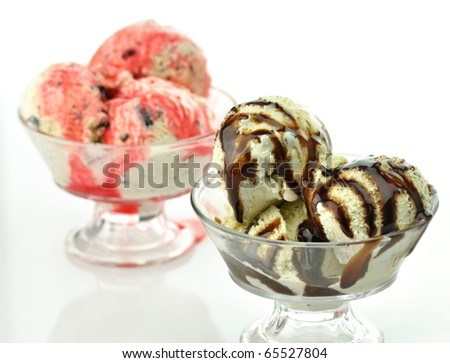 cookies\' ice cream  with chocolate and strawberry topping