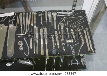 OLD FASHIONED SURGICAL TOOLS USED BY DOCTORS.