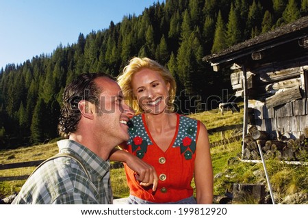 Couple on mountain pasture