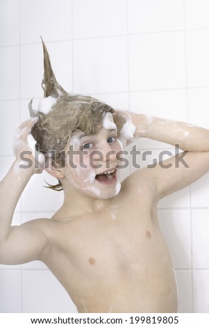 Boy during hair washing