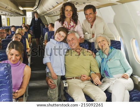 Family sitting on airplane
